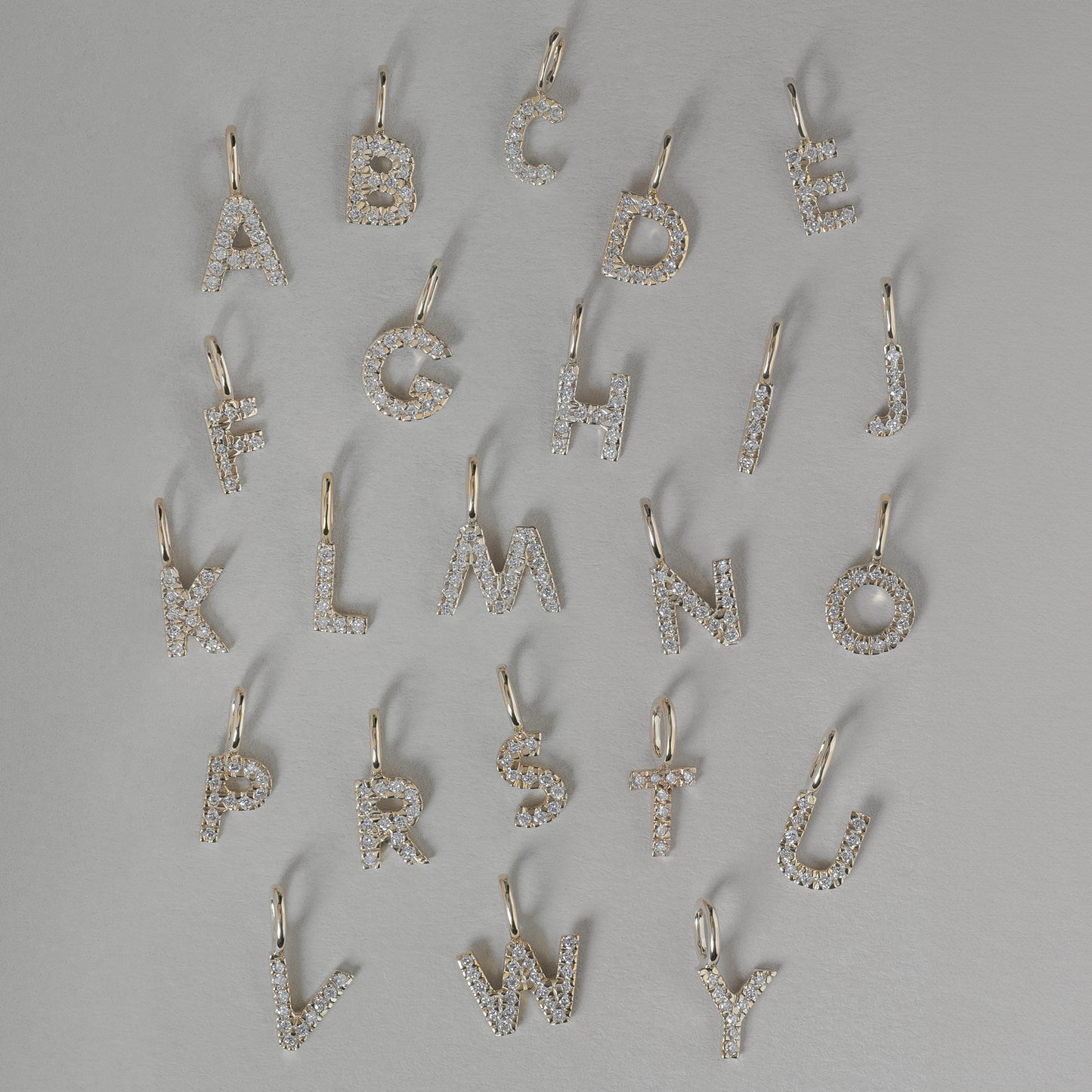 diamond Letter Charm 375 9k solid gold massiv guld lab grown diamant pendant vedhæng bogstav HandcraftedCPH handcrafted Copenhagen handmade Danish design molten organic texture symbol petit cute smeltet lab diamant bogstavvedhæng initial letters