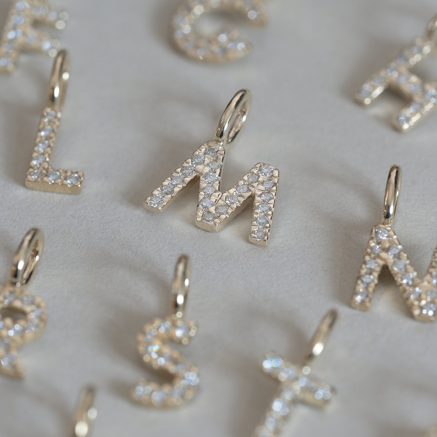 diamond Letter Charm 375 9k solid gold massiv guld lab grown diamant pendant vedhæng bogstav HandcraftedCPH handcrafted Copenhagen handmade Danish design molten organic texture symbol petit cute smeltet lab diamant bogstavvedhæng initial letters
