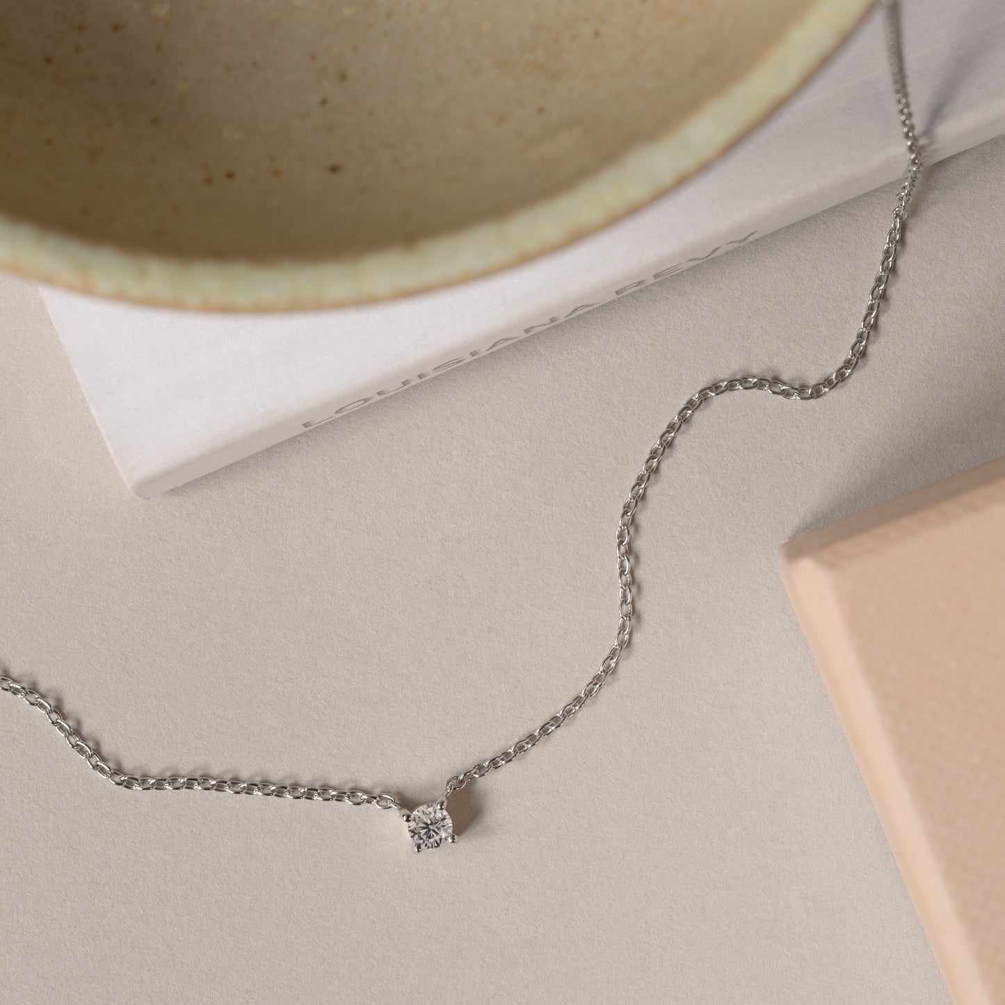 Sophie white necklace handcraftedcph white clear moissanite floating diamond 9k white solid gold hvidguld necklace halskæde guldhalskæde ren massiv guld lab moissanite floating elegant timeless handmade handcrafted danish design