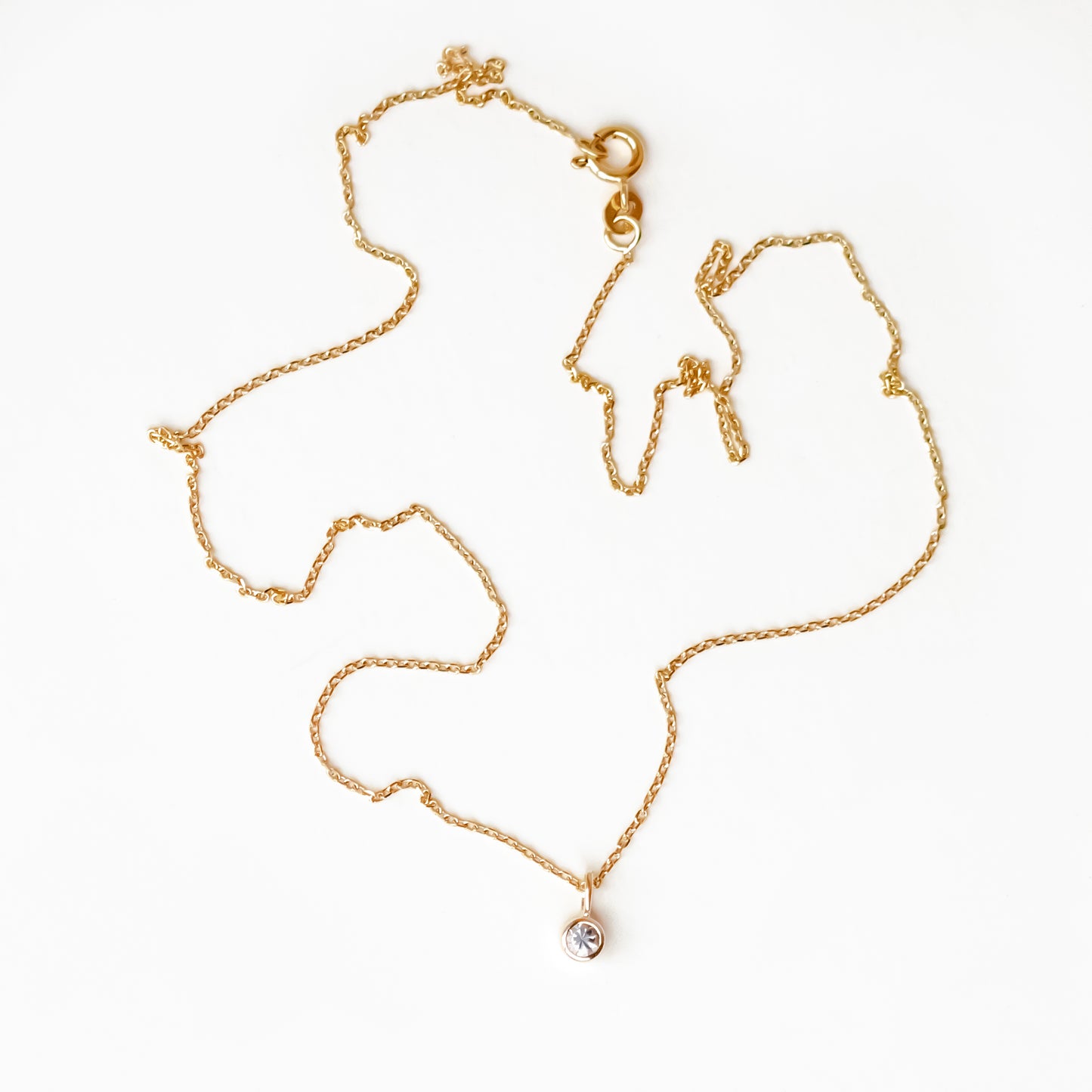 claire charm pendant solid gold white sapphire bezel set with cable diamond cut chain