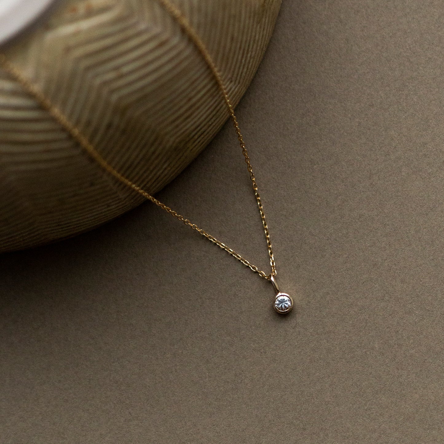 claire charm pendant solid gold white sapphire bezel set with cable diamond cut chain