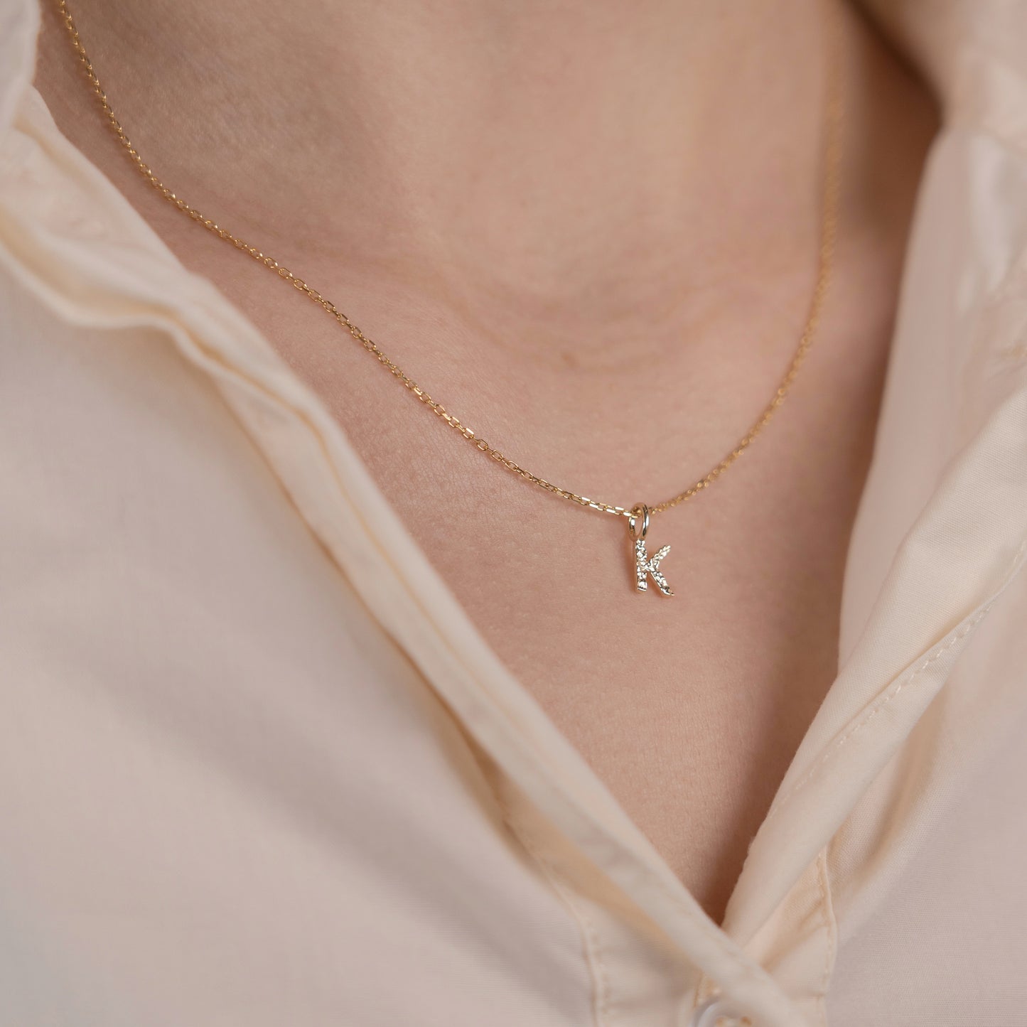 Letter Charm 375 9k solid gold massivt guld pendant vedhæng bogstav HandcraftedCPH handcrafted Copenhagen handmade Danish design molten organic texture symbol petit cute smeltet organisk bogstaver letters