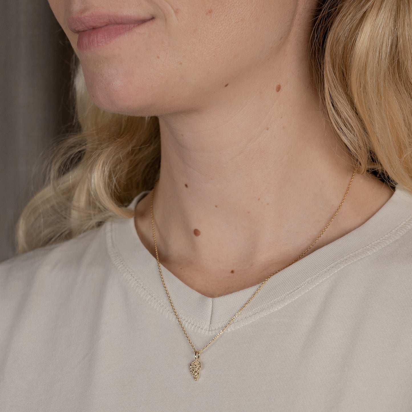 Molten Split Hearts Charm 375 9k solid gold massivt guld pendant vedhæng hjertevedhæng hjerte knækhjerte smeltet organic organisk smooth HandcraftedCPH handcrafted Copenhagen handmade friendship best friends cute petit