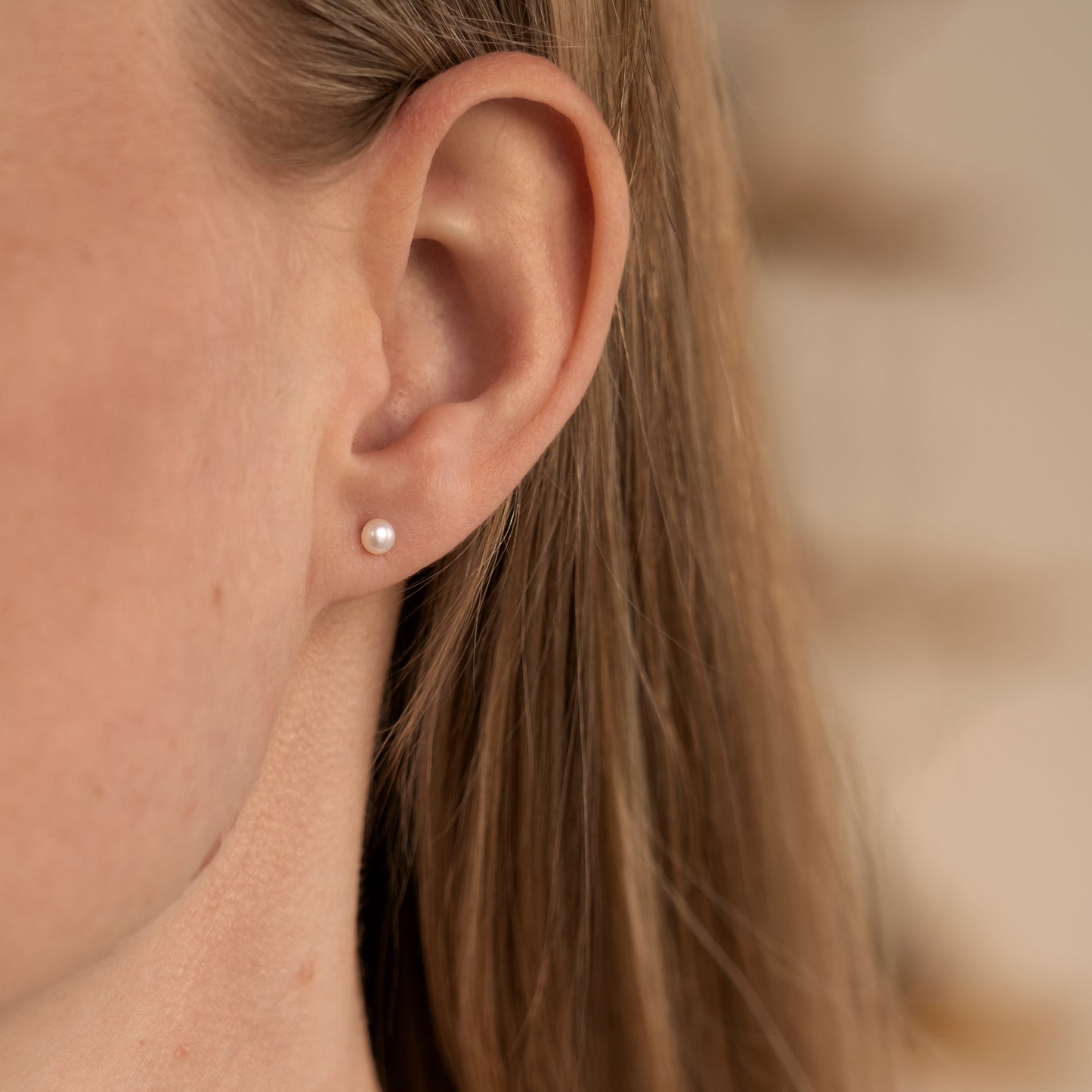 Nima pearl ear studs handcraftedcph handcrafted cph sterling silver 18k gold plated forgyldt sølv ferskvandsperle perleørering perleørestikker freshwater pearls natural ear sticks handmade classic danish design copenhagen earrings