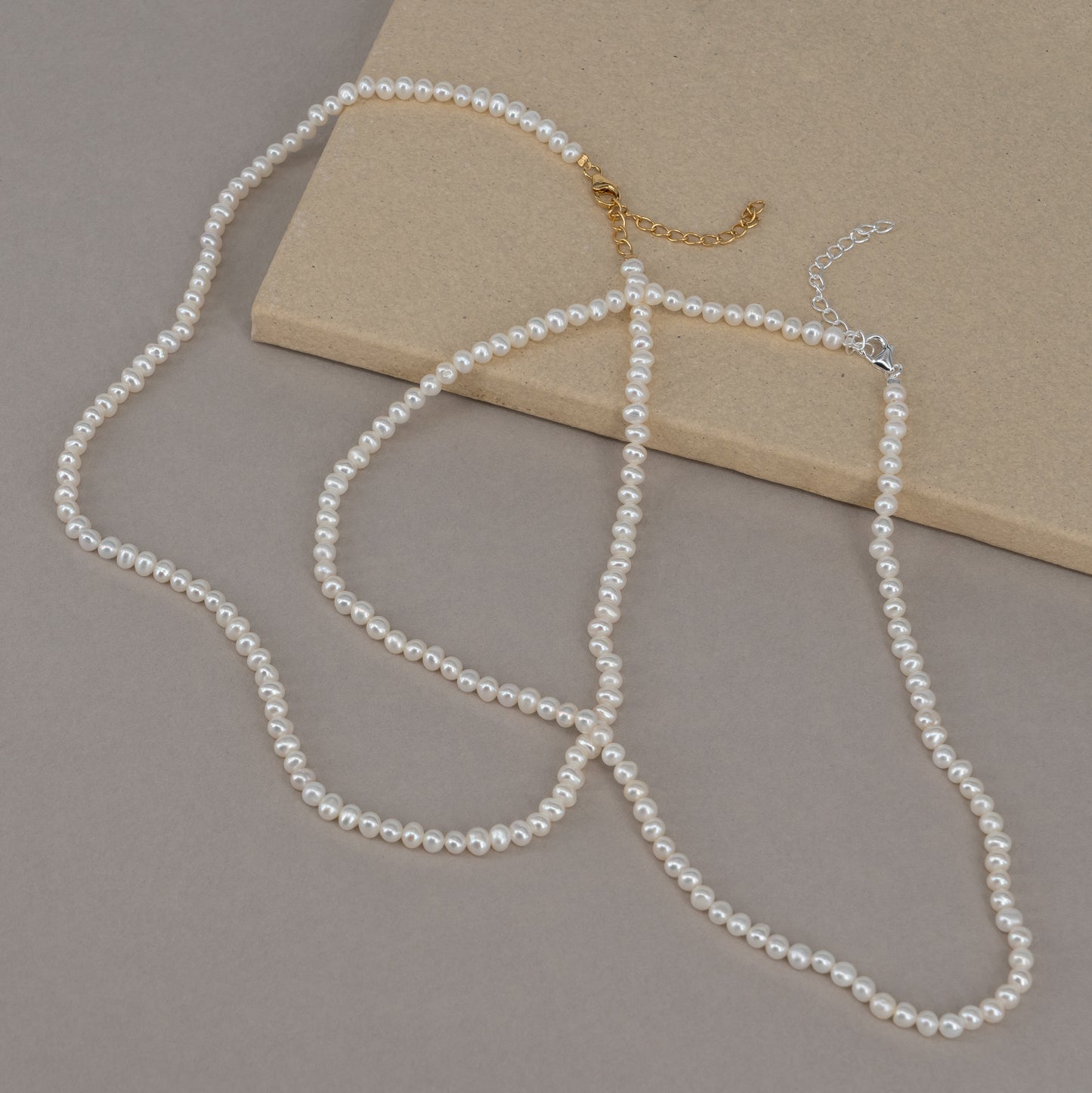 Noor pearl necklace handcraftedcph sterling silver sølv 18k gold plated 18kt forgyldt ferskvandsperler freshwater pearls handmade danish design handcrafted classic one size adjustable perlehalskæde