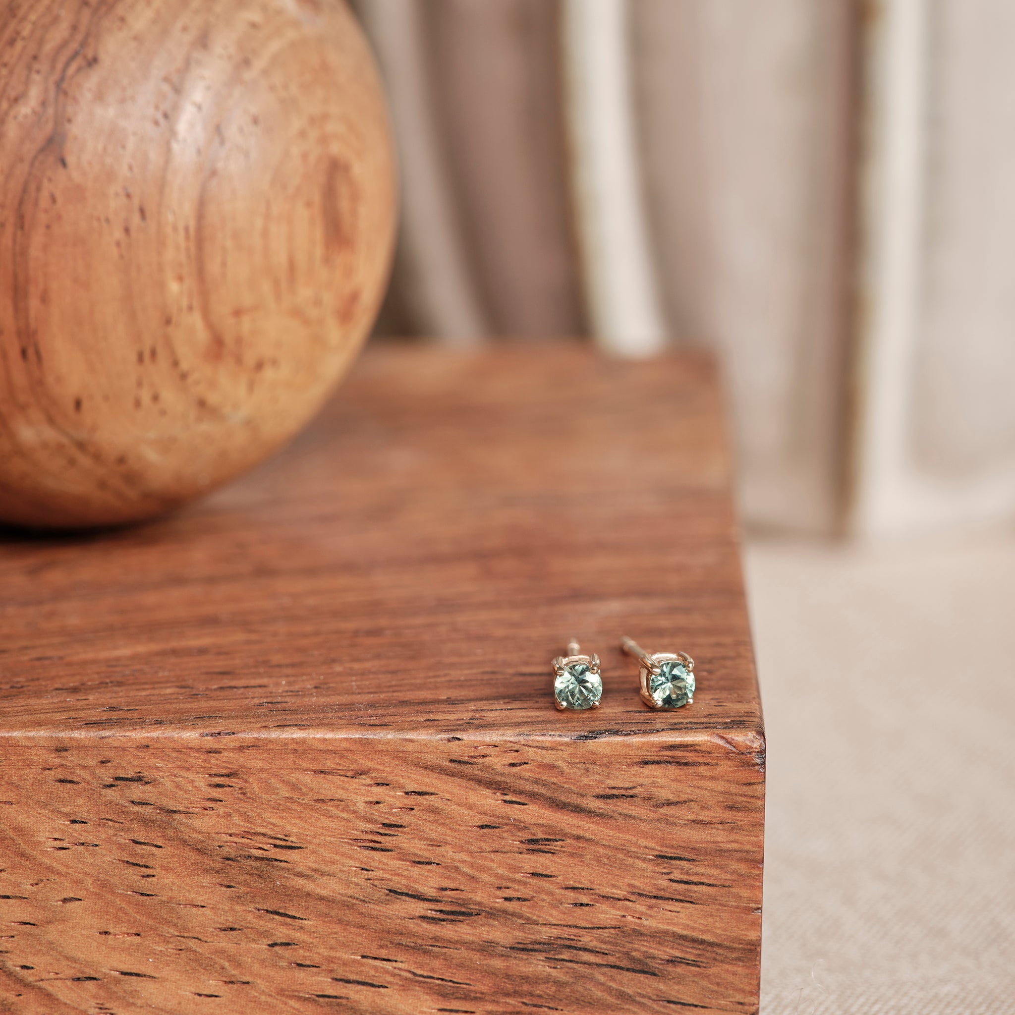 Green sapphire store stud earrings