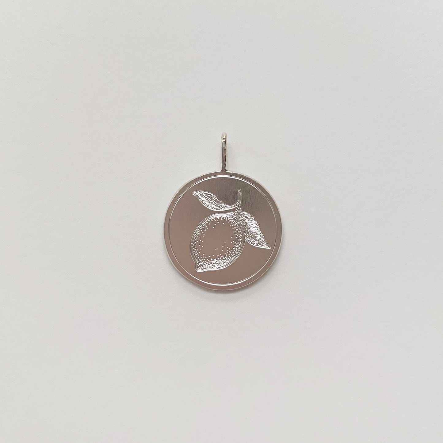 lemon pendant charm engraved signature pendant citron necklace halskæde vedhæng pendant sølv silver 18k gold plated handmade handcraftedcph danish design copenhagen