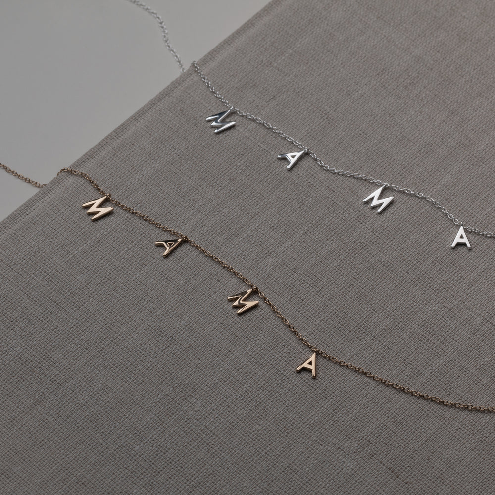 
                  
                    Mama necklace handcraftedcph mor halskæde letter thin diamond cut cable chain letter bogstav mama handmade danish design sølv forgyldt silver 18k gold plated handcrafted
                  
                