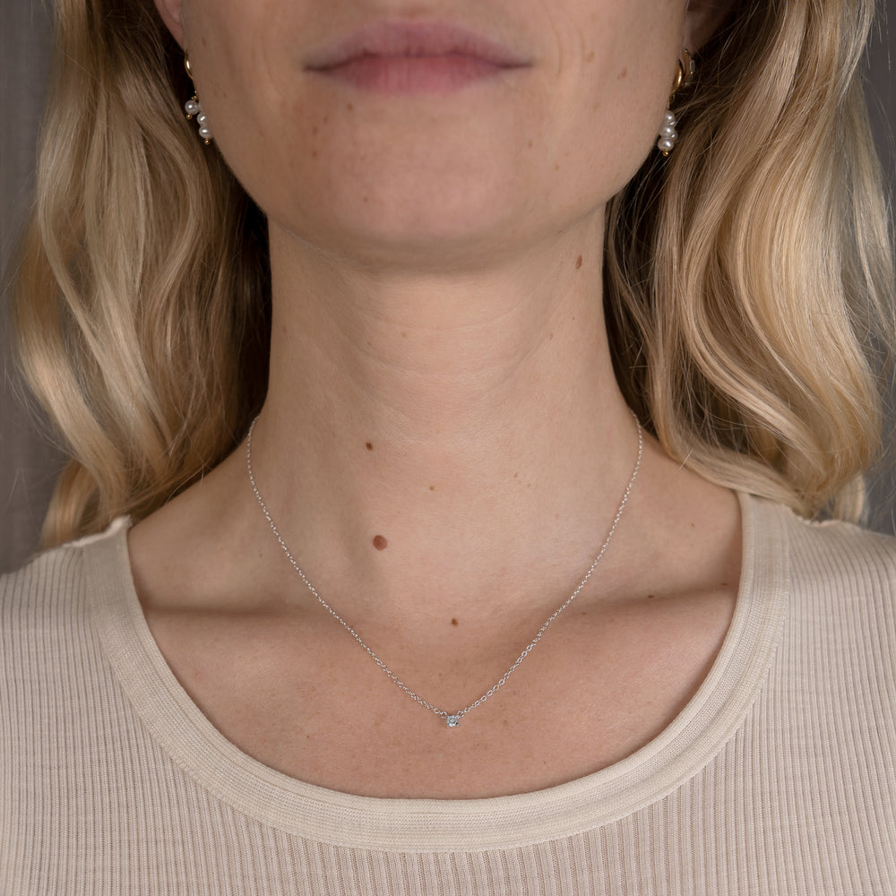 
                      
                        Sophia Necklace 925 Sterling silver 18k gold plated forgyldt sølv halskæde floating zircon crystal krystal simple elegant Danish design HandcraftedCPH handcrafted Copenhagen handmade classic timeless
                      
                    