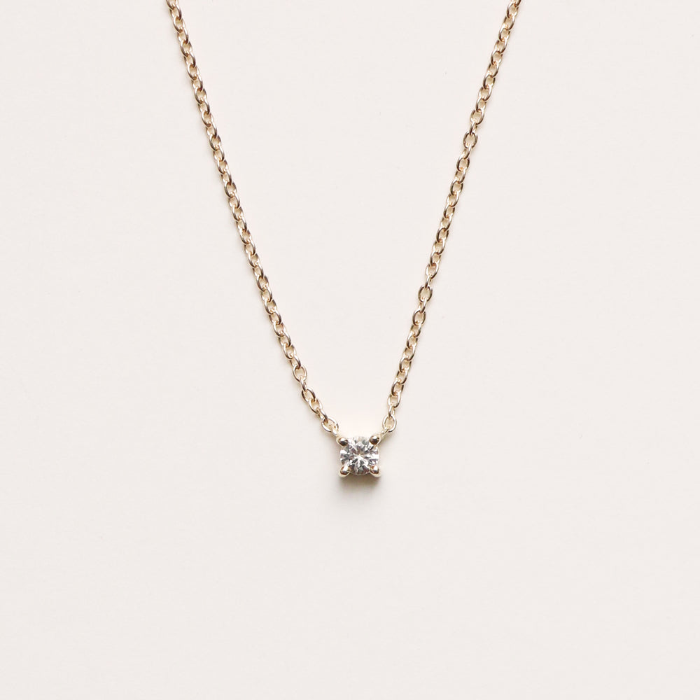 
                  
                    solid gold white sapphire necklace
                  
                
